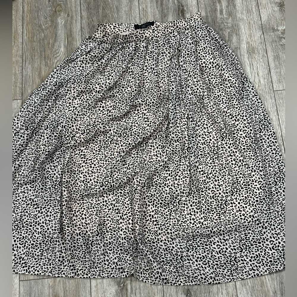 Unworn pink and black leopard print midi skirt